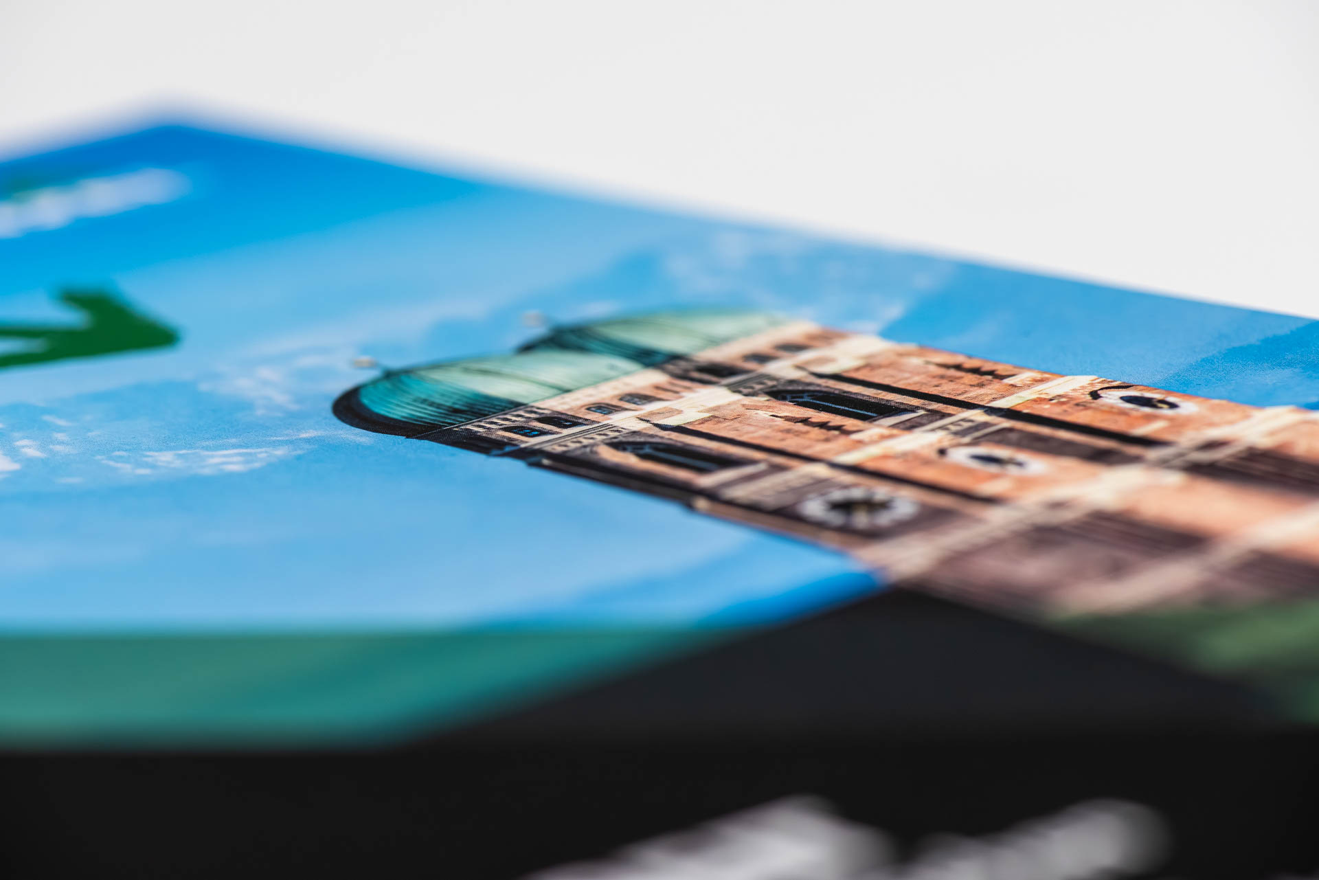 Close-up of a colourful softcover booklet