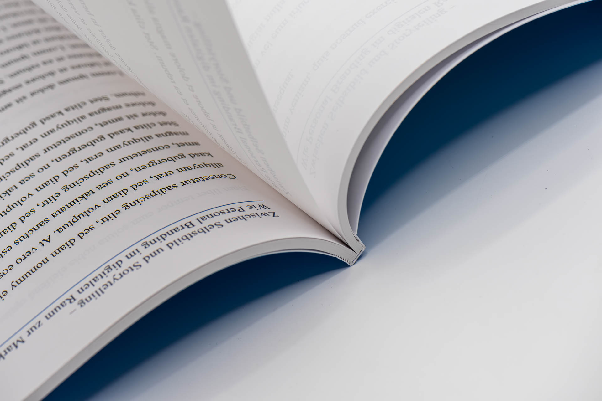 Close-up of a softcover brochure laid flat